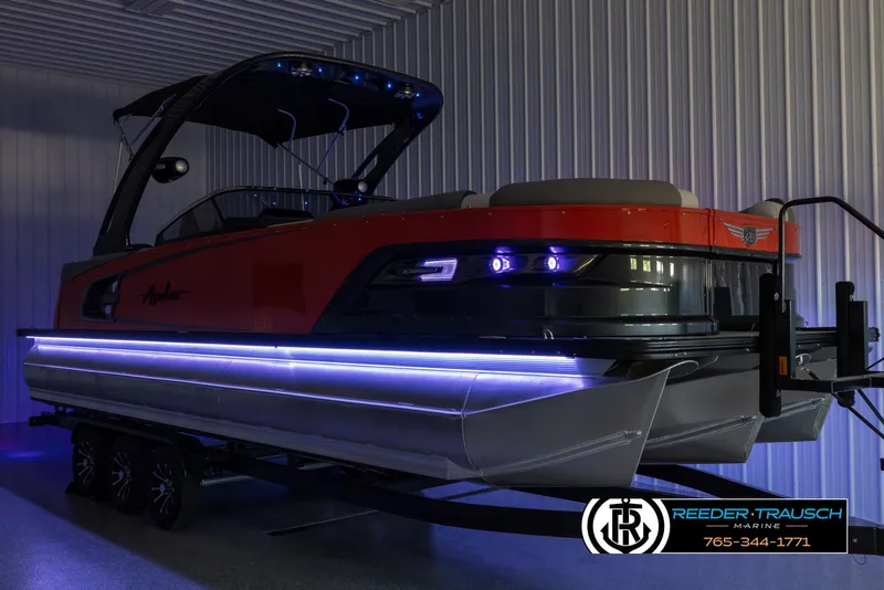 Slide: The Image of 2024 Avalon 2785 Excalibur EL pontoon boat with LED lights in a showroom. - 5