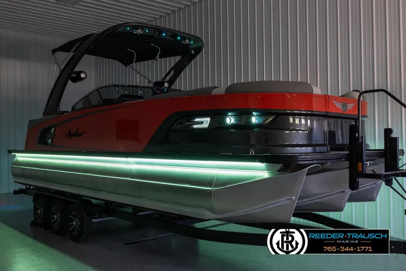 Slide: The Image of 2024 Avalon 2785 Excalibur EL pontoon boat with LED lights on trailer. - 6