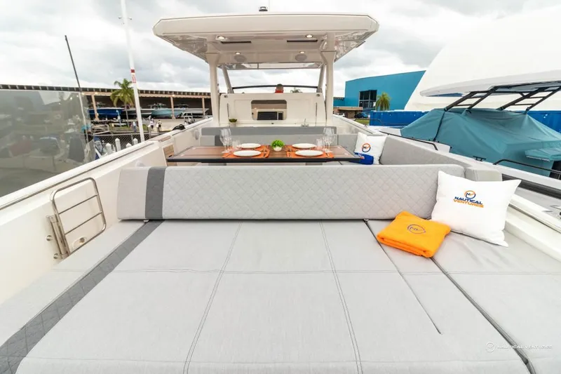 Slide: The Image of 2022 Windy SR44 SX yacht with spacious deck and dining area. - 33