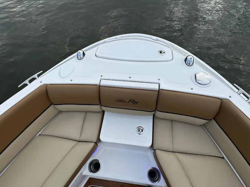 Slide: The Image of 2015 Sea Ray 350 SLX boat bow with tan seating and water view. - 28