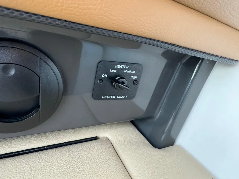 Slide: The Image of Heater control panel on 2015 Sea Ray 350 SLX boat interior. - 42