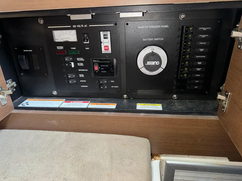 Slide: The Image of Electrical control panel of 2015 Sea Ray 350 SLX boat. - 48