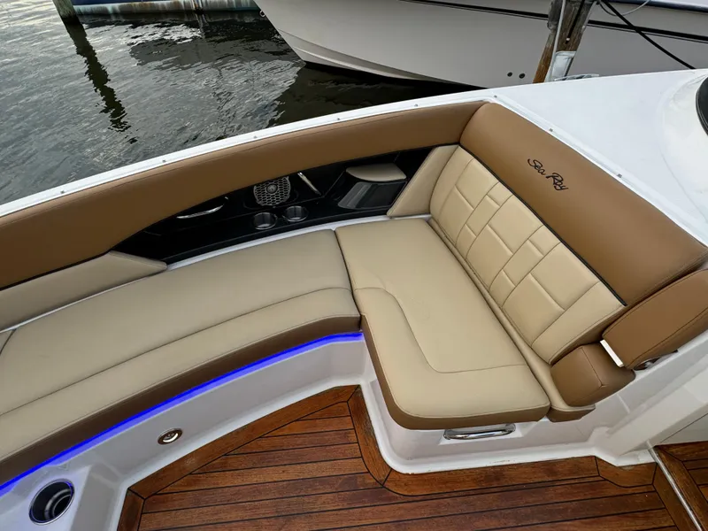 Slide: The Image of Luxurious seating on 2015 Sea Ray 350 SLX boat with teak flooring and LED lighting. - 30