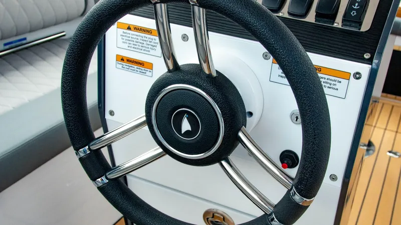 Slide: The Image of Steering wheel of 2023 Alfastreet 21 Open boat with control panel. - 13