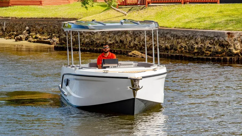 Slide: The Image of 2023 Alfastreet 21 Open boat cruising on a calm river. - 2