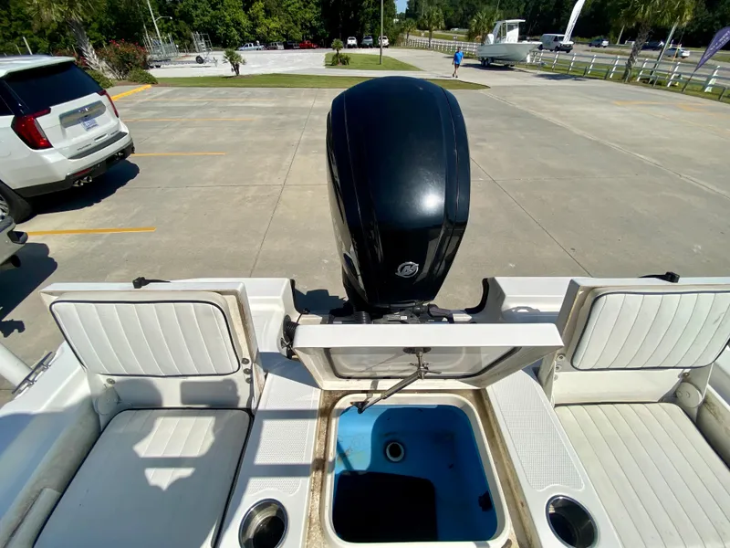 Slide: The Image of 2017 Mako 19 CPX boat with outboard motor and seating. - 6