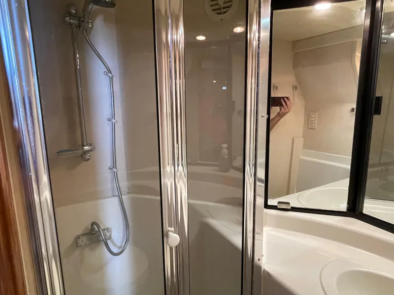 Slide: The Image of Bathroom shower area in a 1998 Bayliner 4788 Pilot House Motoryacht. - 29