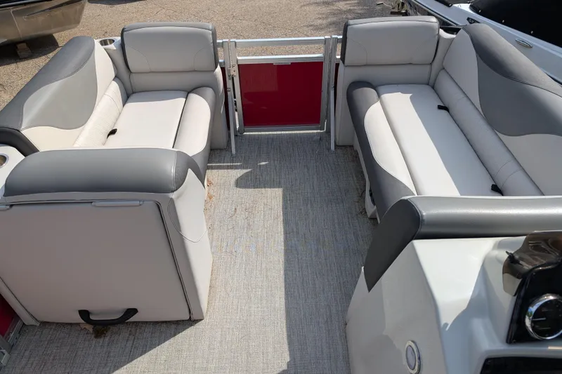 Slide: The Image of 2023 Avalon VENTURE CRUISE boat interior with gray and white seating arrangement. - 4