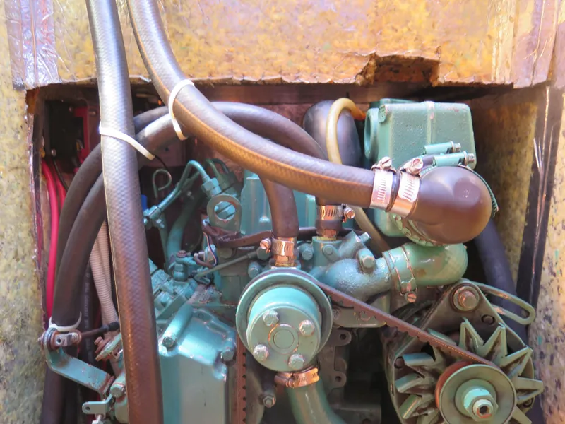 Slide: The Image of Engine compartment of a 2002 Arcona 355 Sloop sailboat. - 28