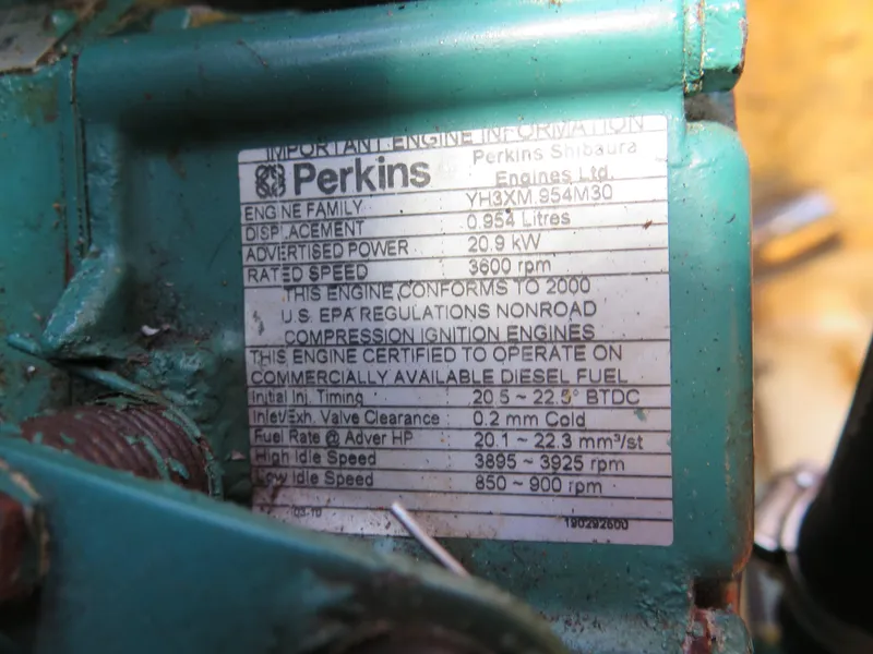 Slide: The Image of Perkins engine information plate on a 2002 Arcona 355 Sloop. - 29