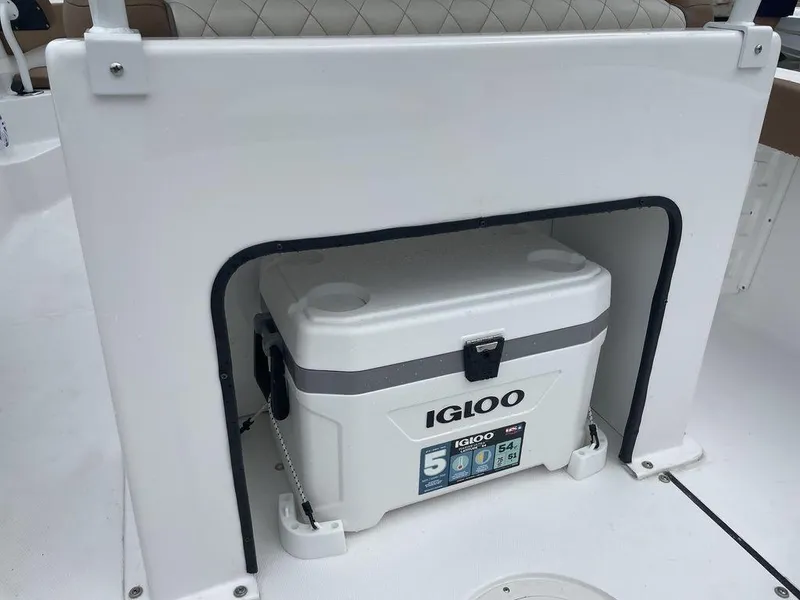 Slide: The Image of Igloo cooler stored on a 2024 Polar 220 CC boat. - 14