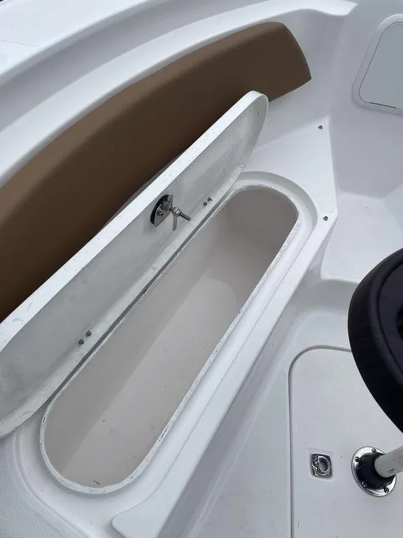 Slide: The Image of 2024 Polar 220 CC boat storage compartment. - 5