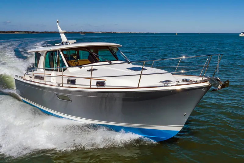 Slide: The Image of 2024 Sabre 43 Salon Express cruising on open water. - 2