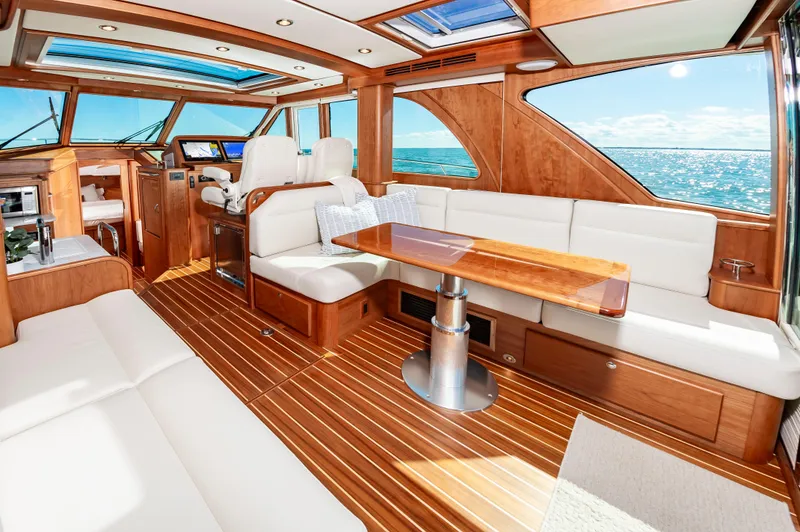 Slide: The Image of Luxurious interior of 2024 Sabre 43 Salon Express yacht with ocean view. - 21