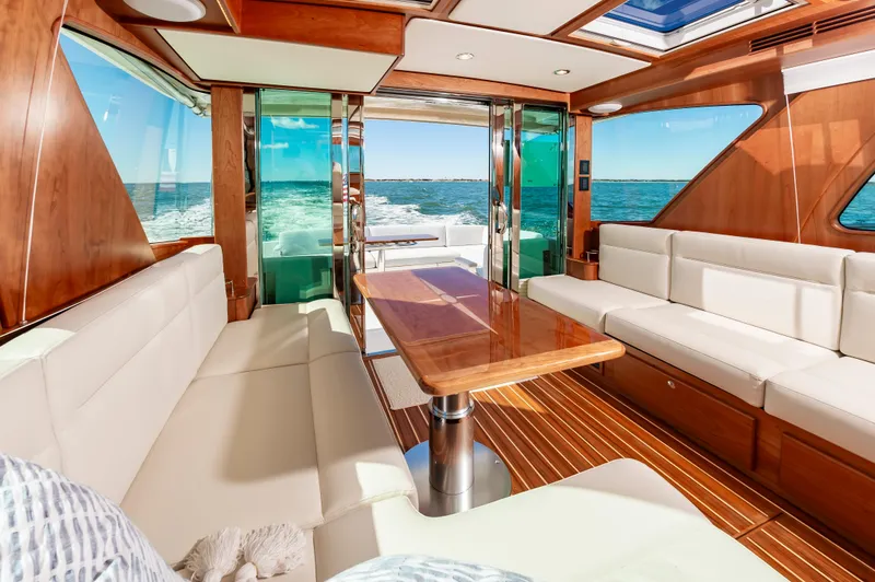 Slide: The Image of Luxurious interior of 2024 Sabre 43 Salon Express yacht with ocean view. - 24