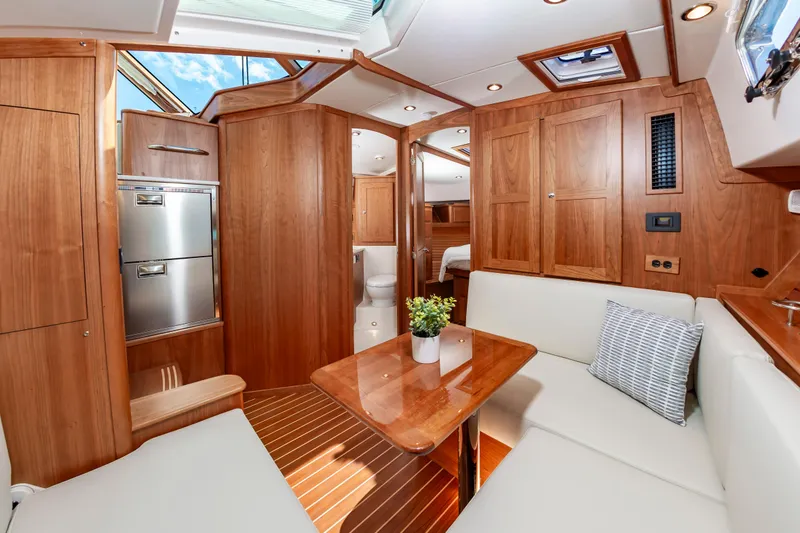 Slide: The Image of Interior of 2024 Sabre 43 Salon Express yacht with wooden finishes and modern amenities. - 44