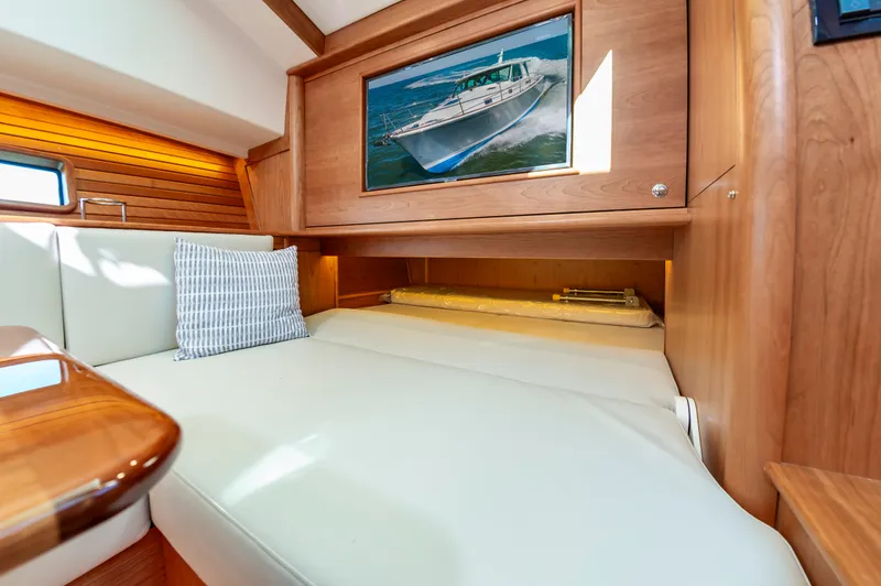 Slide: The Image of Interior cabin of 2024 Sabre 43 Salon Express yacht with comfortable seating. - 46