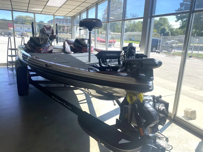 Slide: The Image of 2021 Ranger Z521L fishing boat in showroom, equipped with Garmin electronics. - 10