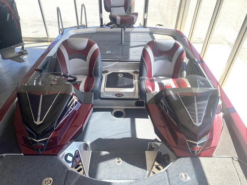 Slide: The Image of 2021 Ranger Z521L boat interior with dual seats and sleek design. - 17