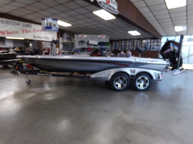 Slide: The Image of 2021 Ranger Z521L boat displayed indoors on a trailer. - 5