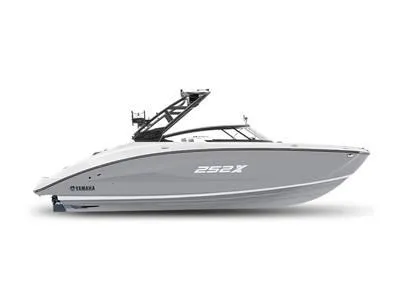 The Image of 2024 Yamaha Boats 252XE, sleek gray and white design, side view. - 1