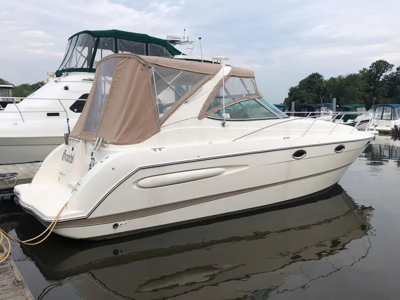 The Image of 2002 Maxum 3300 SCR boat docked at a marina. - 0