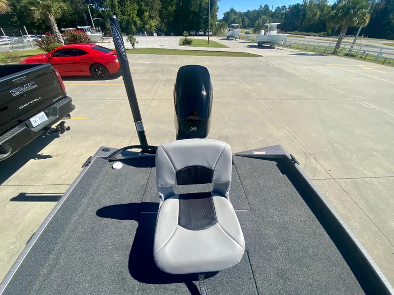 Slide: The Image of 2023 Crestliner 1600 Storm boat with a single seat and outboard motor. - 5