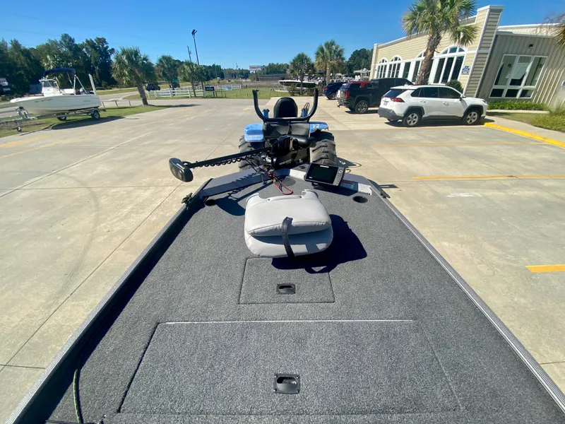 Slide: The Image of 2023 Crestliner 1600 Storm boat on trailer in parking lot. - 10