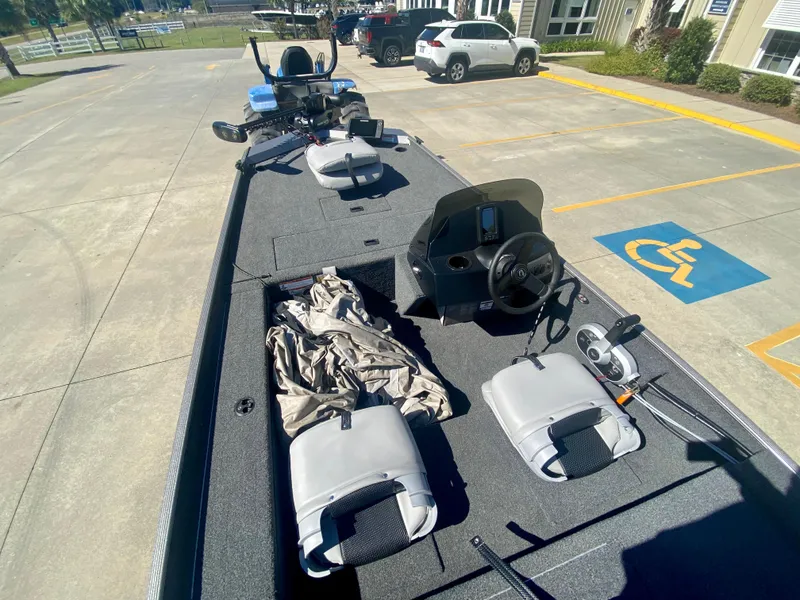 Slide: The Image of 2023 Crestliner 1600 Storm fishing boat interior with seats and steering console. - 6