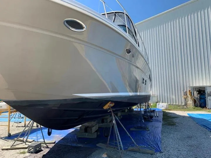 Slide: The Image of 2006 Sea Ray 52 Sedan Bridge yacht on dry dock for maintenance. - 8