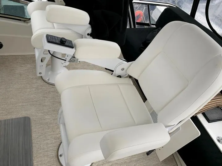 Slide: The Image of Captain's chairs on the 2006 Sea Ray 52 Sedan Bridge yacht. - 9