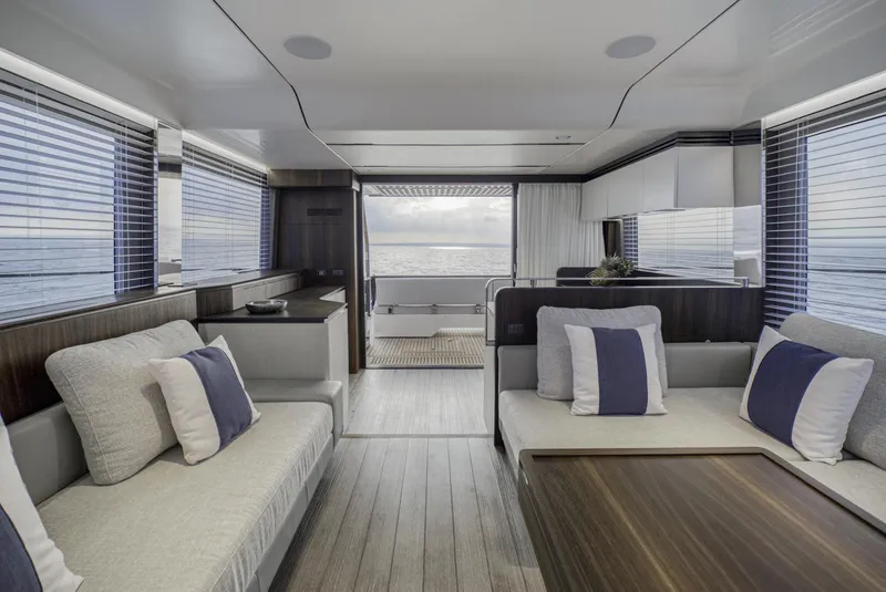 Slide: The Image of Luxurious interior of the 2024 Astondoa AS5 yacht with modern furnishings and ocean view. - 13