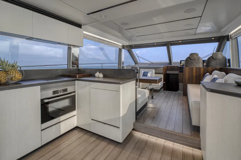 Slide: The Image of Luxurious interior of 2024 Astondoa AS5 yacht with modern kitchen and seating area. - 14