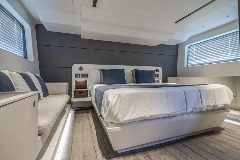 Slide: The Image of Luxurious 2024 Astondoa AS5 yacht bedroom with modern design and elegant furnishings. - 16