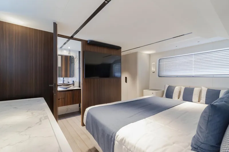Slide: The Image of Luxurious bedroom interior of 2024 Astondoa AS5 yacht with modern design and en-suite bathroom. - 17