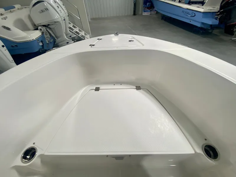 Slide: The Image of 2024 Robalo R180 Center Console boat interior, front storage compartment. - 16