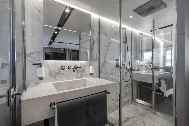 Slide: The Image of Luxurious marble bathroom in 2024 Astondoa AS8 yacht with modern fixtures. - 29