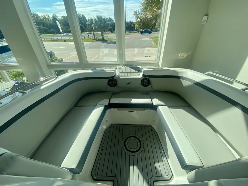 Slide: The Image of 2024 Starcraft SVX 230 OB boat interior with spacious seating and modern design. - 24
