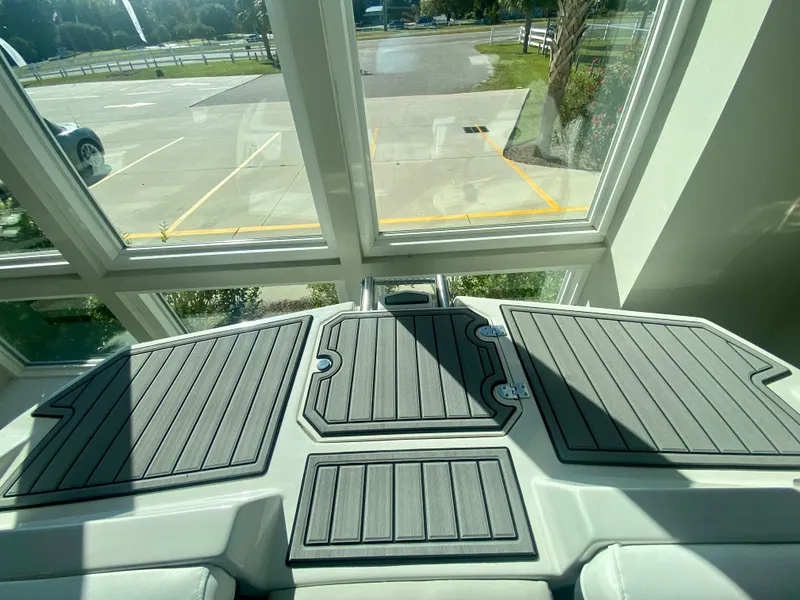 Slide: The Image of 2024 Starcraft SVX 230 OB boat deck with non-slip flooring. - 29