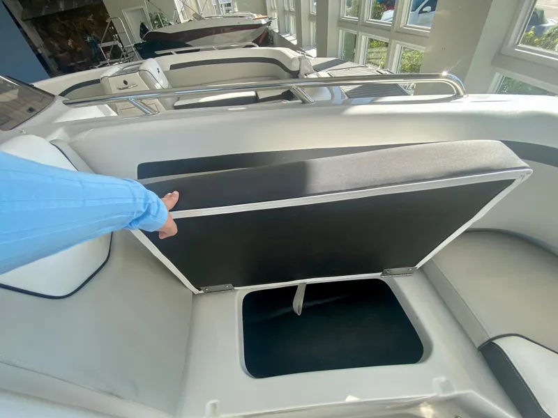 Slide: The Image of 2024 Starcraft SVX 230 OB boat interior storage compartment. - 25