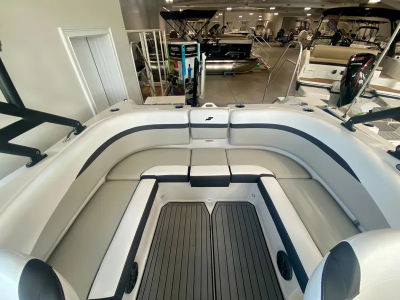 Slide: The Image of 2024 Starcraft SVX 230 OB boat interior with spacious seating and modern design. - 7