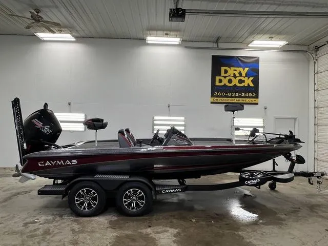 Slide: The Image of 2023 Caymas CX20 Pro bass boat in showroom, side view. - 1