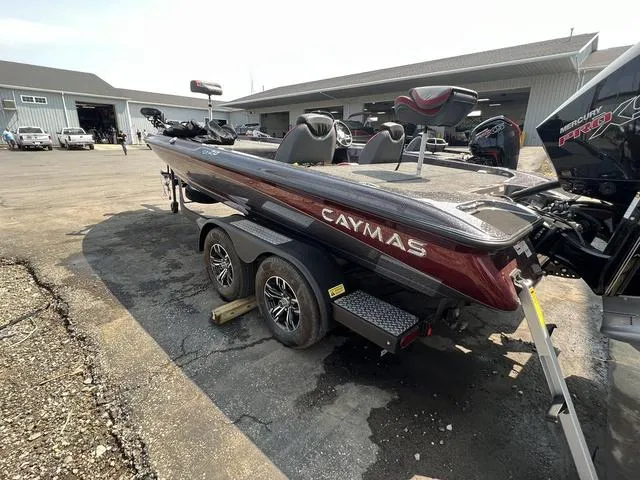 Slide: The Image of 2023 Caymas CX20 Pro boat interior with dual seats and modern dashboard. - 7