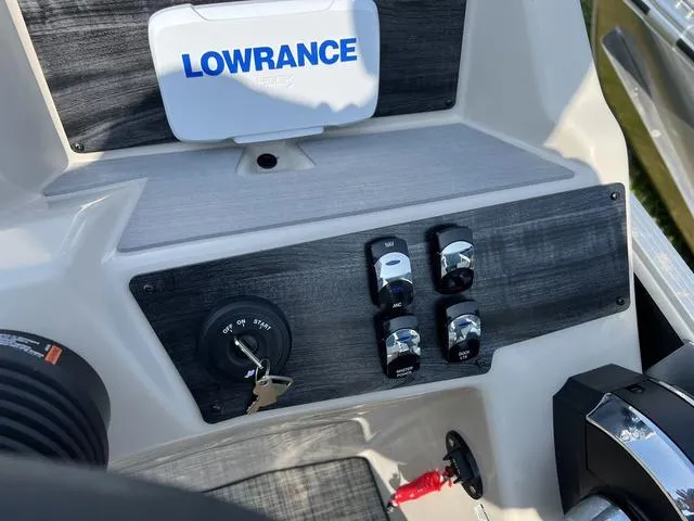 Slide: The Image of Control panel of 2023 Harris Cruiser 210 CW boat with Lowrance electronics. - 11