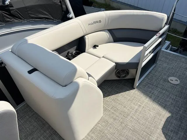 Slide: The Image of 2023 Harris Cruiser 210 CW pontoon boat with luxurious seating. - 15
