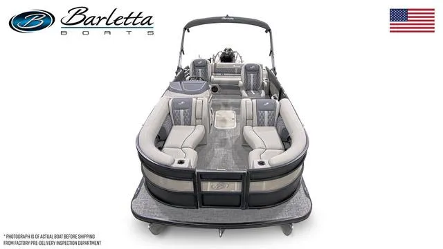 Slide: The Image of 2024 Barletta Boats Lusso 23UC pontoon boat, front view, luxurious seating, American flag. - 4
