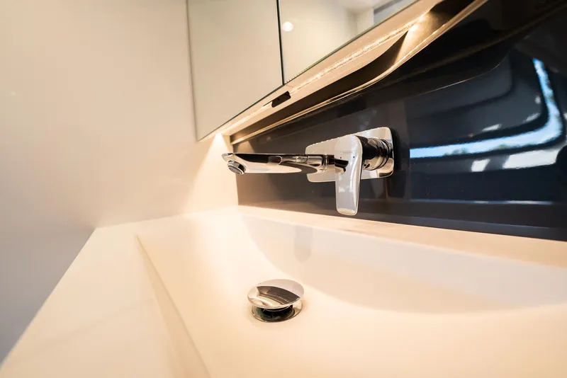Slide: The Image of Modern bathroom sink with sleek faucet in 2022 Princess R Class 35 yacht. - 29