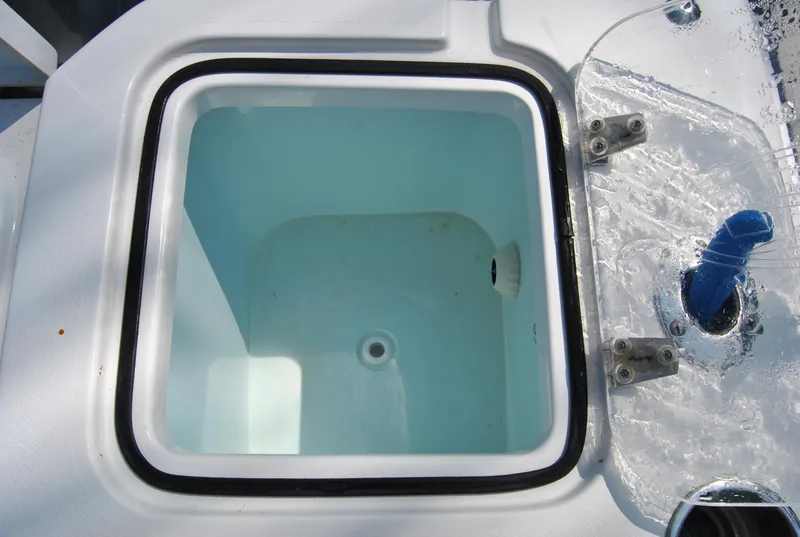 Slide: The Image of Livewell on 2020 Sea Hunt Gamefish 30 boat, featuring a clean, spacious interior. - 17