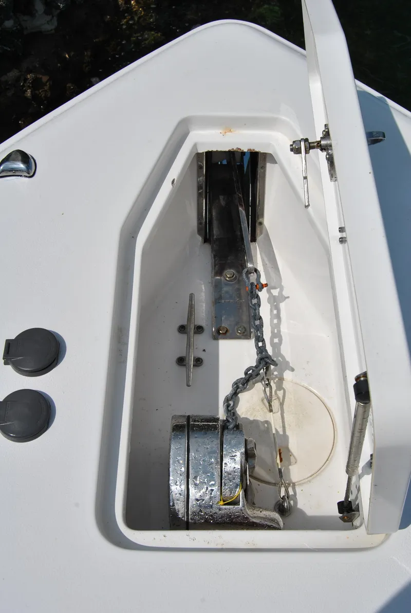 Slide: The Image of 2020 Sea Hunt Gamefish 30 anchor locker with chain and winch. - 31