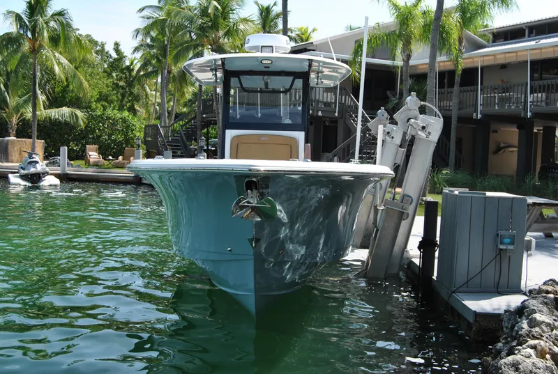 Slide: The Image of 2020 Sea Hunt Gamefish 30 docked in tropical marina setting. - 4